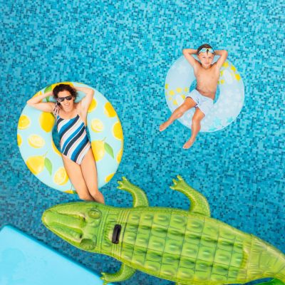 Mother with son on inflatable